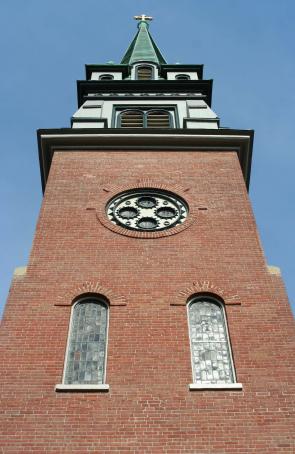 The completed front steeple from a close up vertical perspective. Notice how the detail of the beautiful circular window has been enhanced.