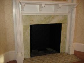 Surface surrounding fireplace painted and marbleized