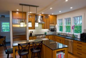 Dye stain on Quarter Sawn Oak cabinets brings out the grain.